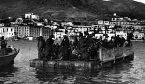 Samsun (Samsoun) Greeks  exchanged to Greece 1923. Picture showing a raft full of Greeks towed to the ships that will take them to Greece